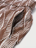 Brown Spiral 7" Crossover Swim Trunks - Image 5
