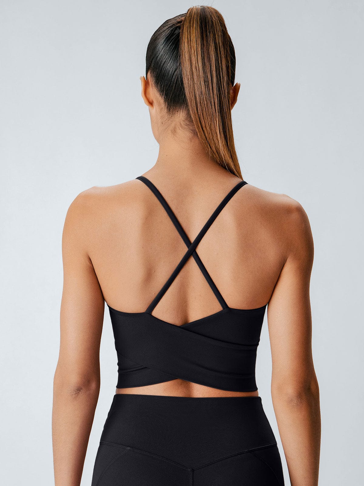 women-knitted-nylon-blended-yoga-sports-bras-sustainable-yoga_tops-cbytv4 Black V Neck X-Cross Sports Bra - Medium Support - Image 1