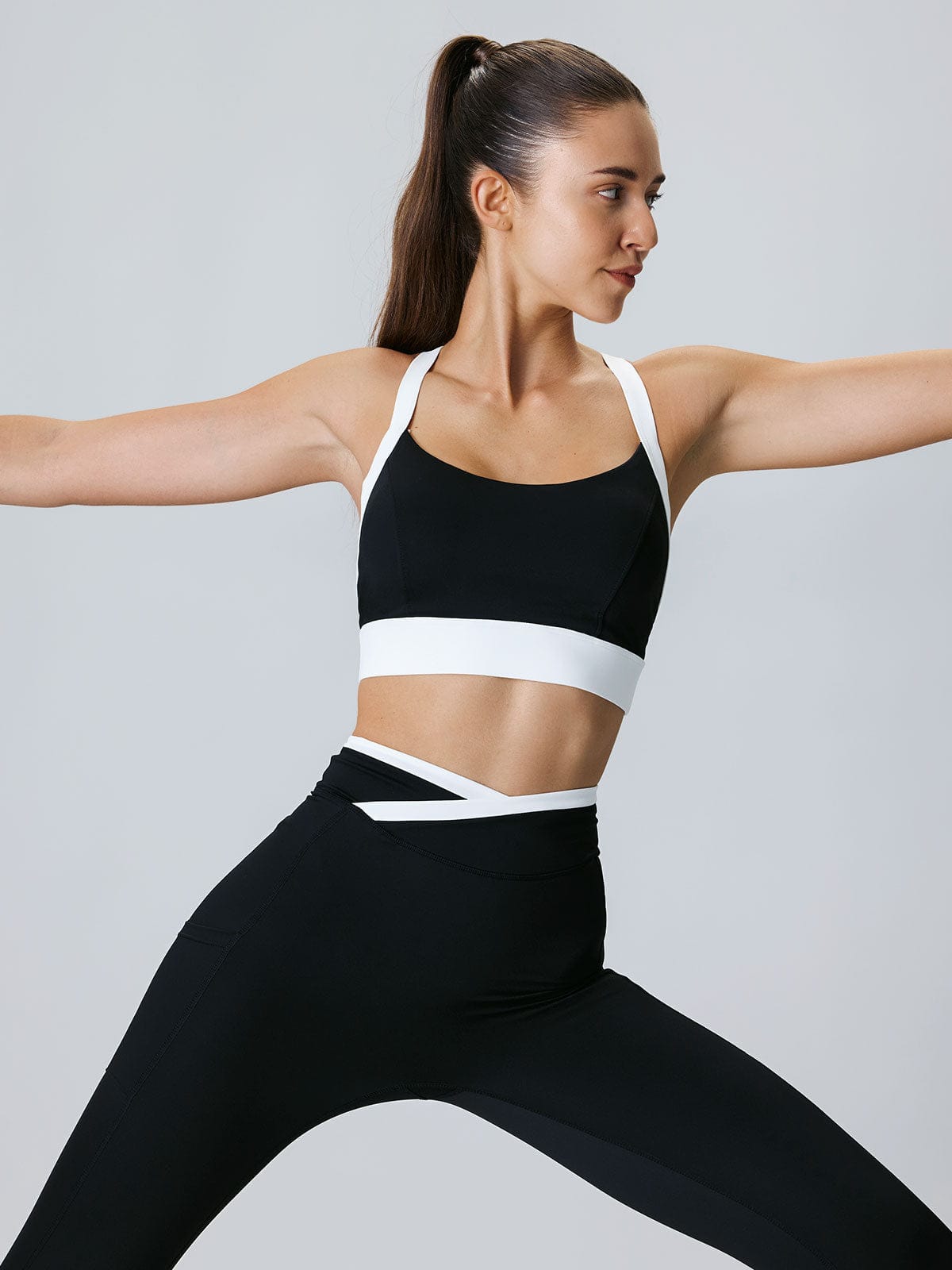 women_s-knitted-nylon-yoga-leggings25_-sustainable-yoga_bottoms-uticyt Black Contrast U Neck Sports Bra - Light Support - Image 1