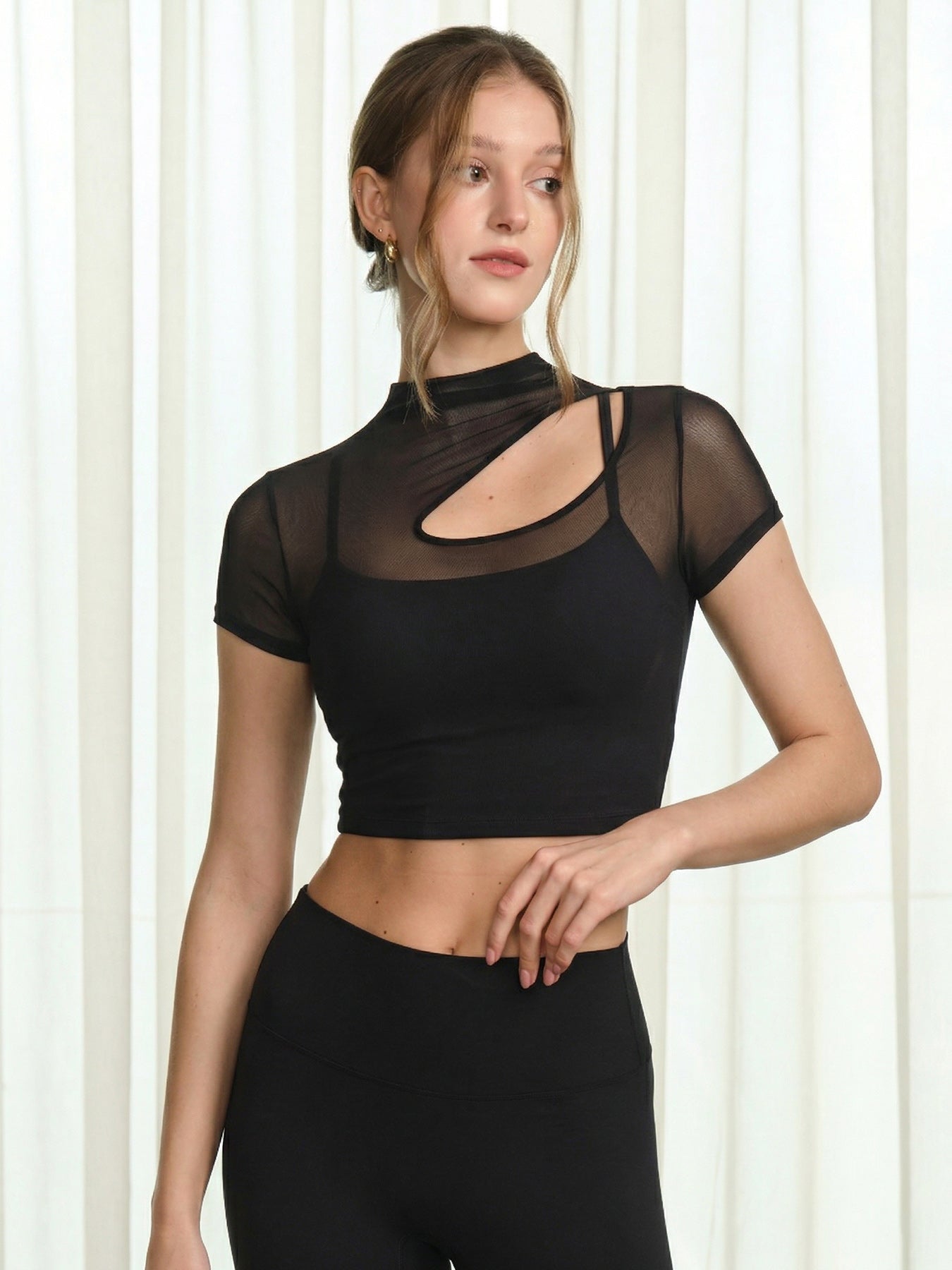 women_s-knitted-nylon-yoga-short-sleeve-tops-black-sustainable-yoga_tops-b7mlii Black Mesh Short Sleeve Top--Light Support - Image 1