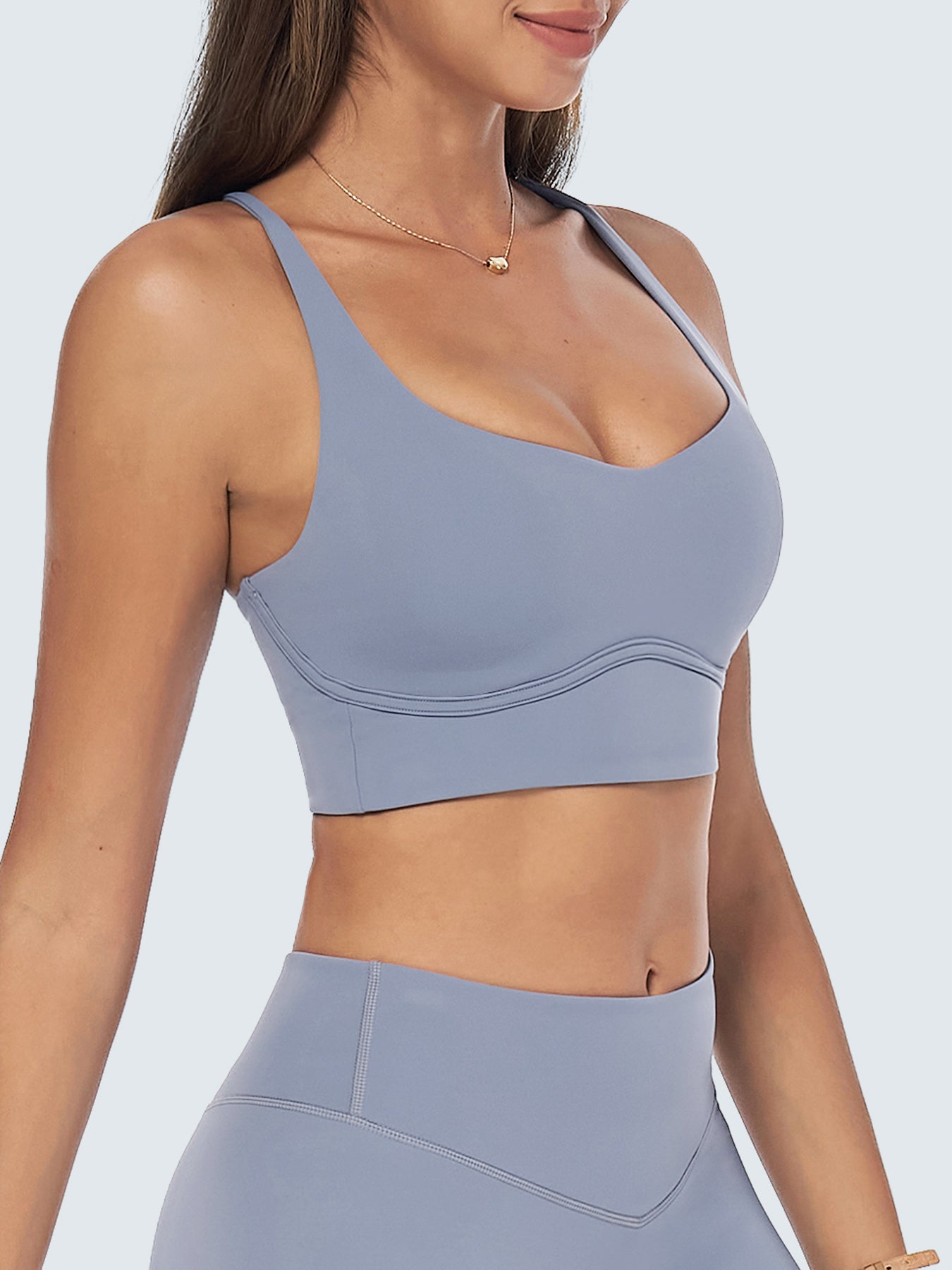women_s-knitted-nylon-yoga-sports-bras-blue-sustainable-yoga_tops-nwvsfe Light Blue Cross-Back Stitch Sports Bra - Image 1