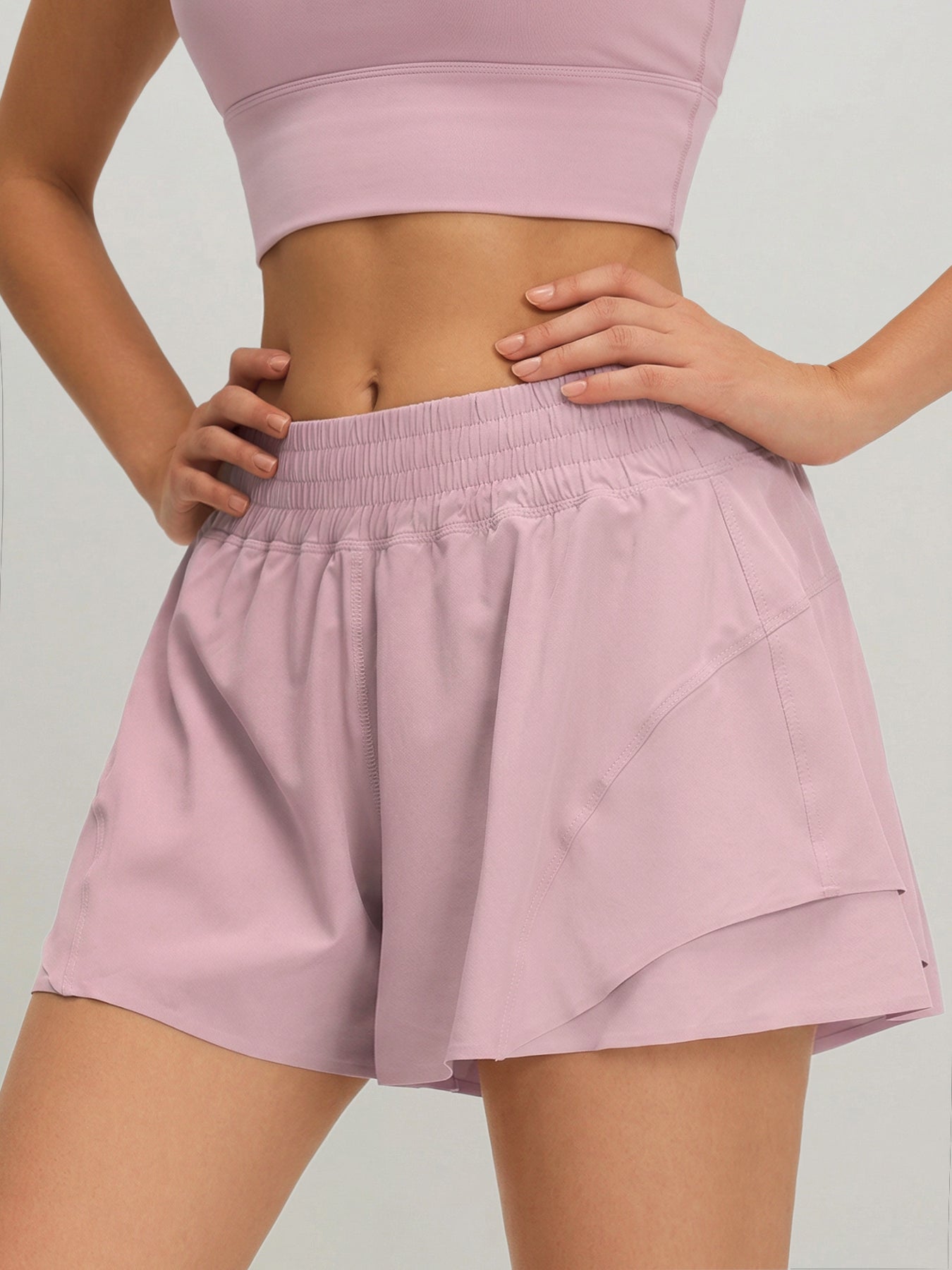 women_s-woven-polyester-yoga-shorts-pink-sustainable-yoga_bottoms-zgtsjq Pink Sports Breathable Shorts - Image 1